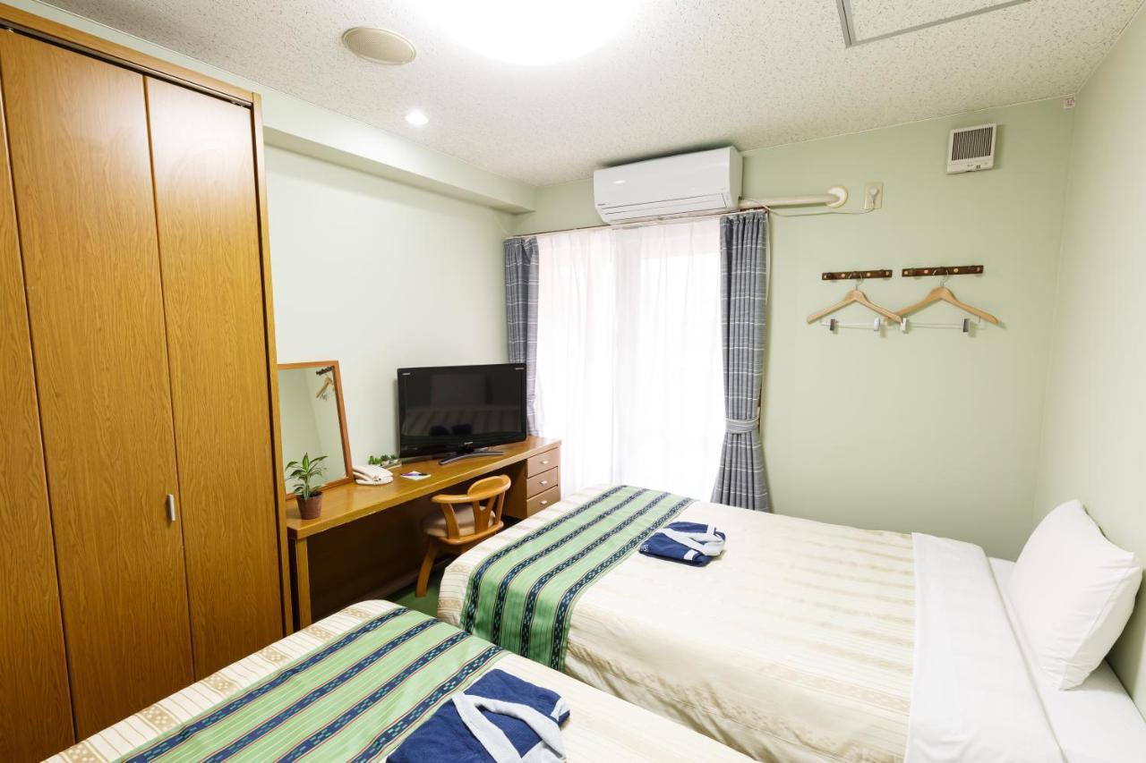 Hotel Peace Land Kume Naha Esterno foto
