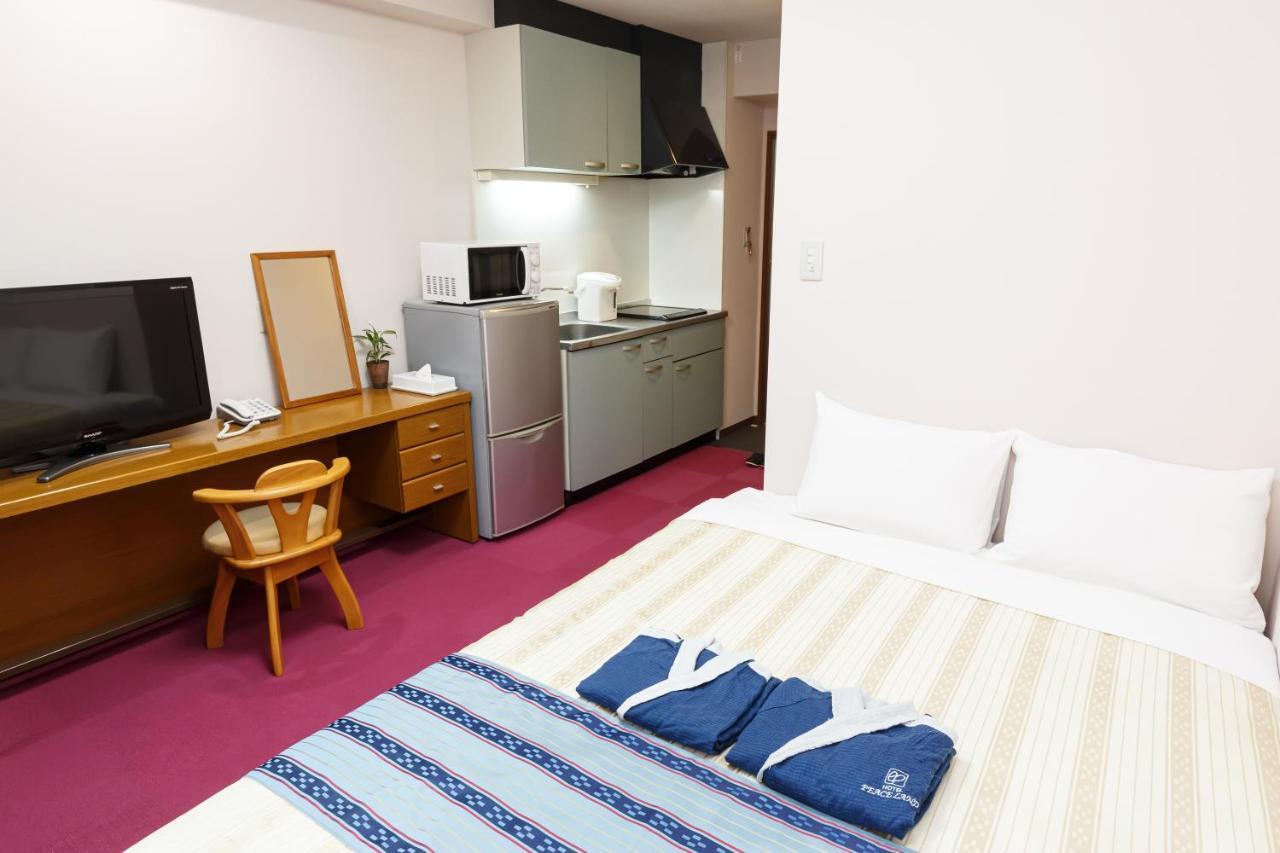 Hotel Peace Land Kume Naha Esterno foto