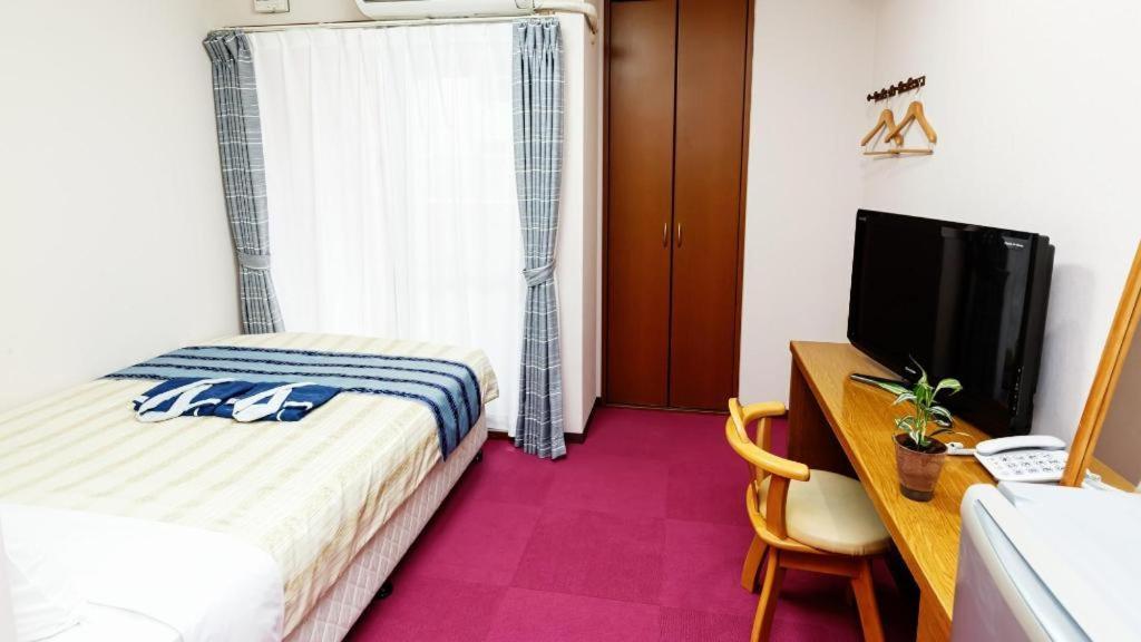 Hotel Peace Land Kume Naha Esterno foto