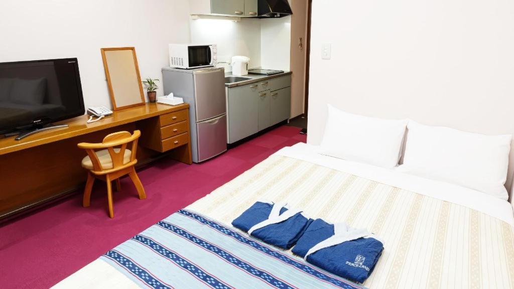 Hotel Peace Land Kume Naha Esterno foto