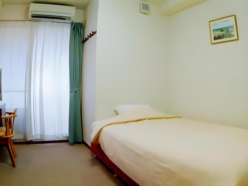 Hotel Peace Land Kume Naha Esterno foto