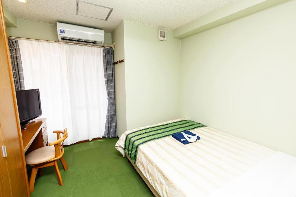 Hotel Peace Land Kume Naha Esterno foto
