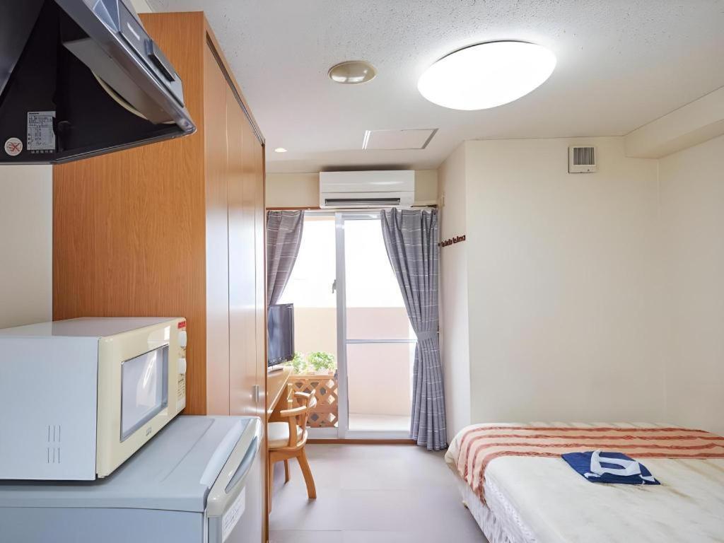 Hotel Peace Land Kume Naha Esterno foto