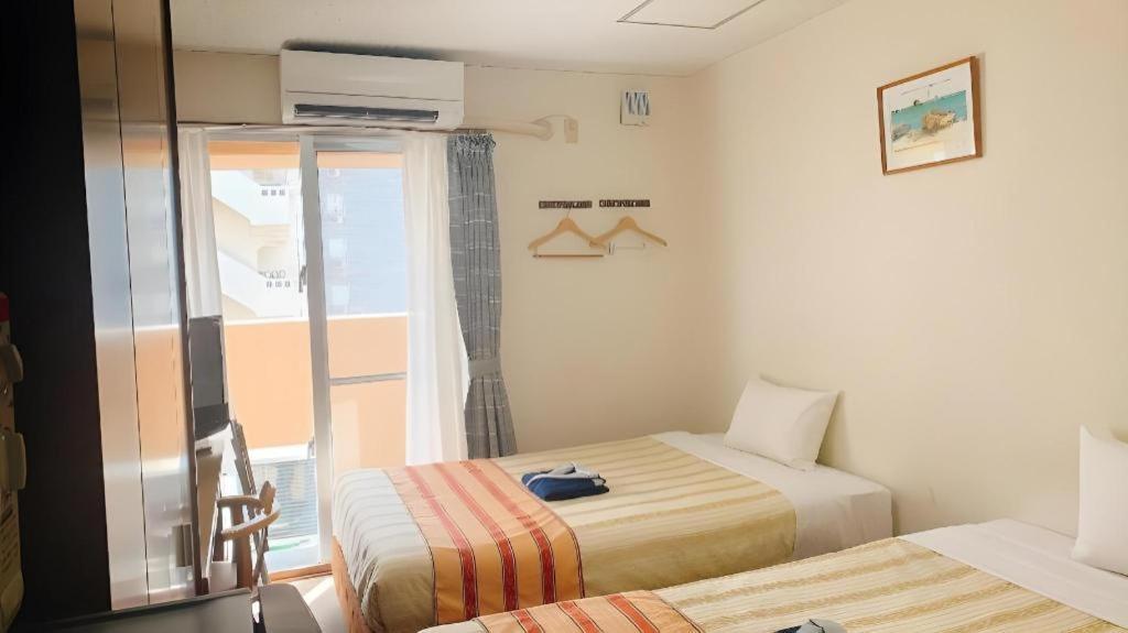 Hotel Peace Land Kume Naha Esterno foto