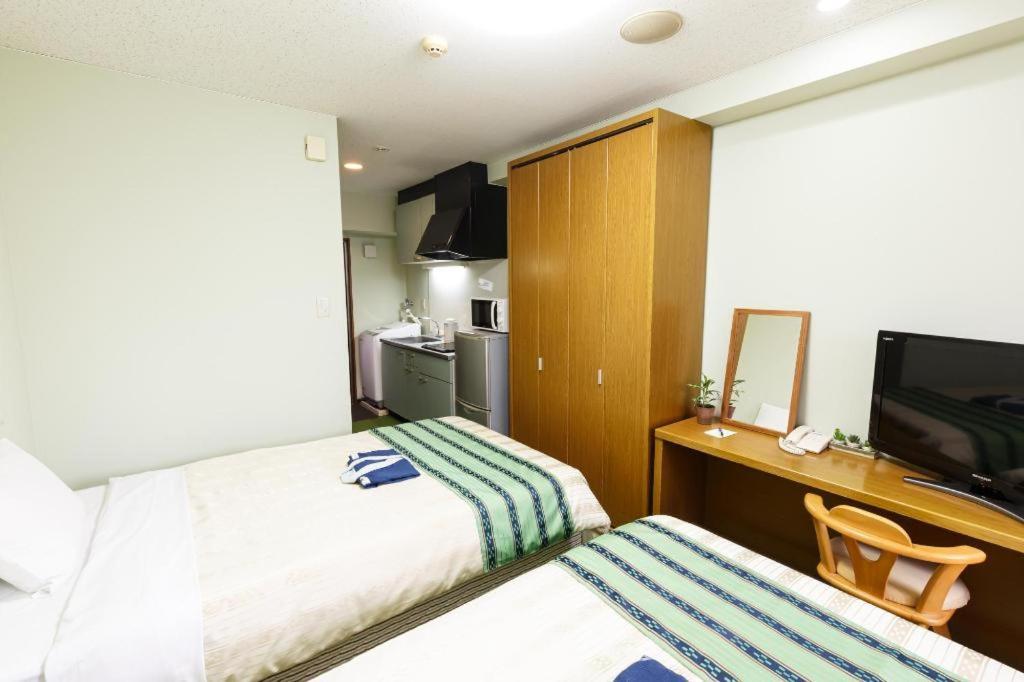 Hotel Peace Land Kume Naha Esterno foto
