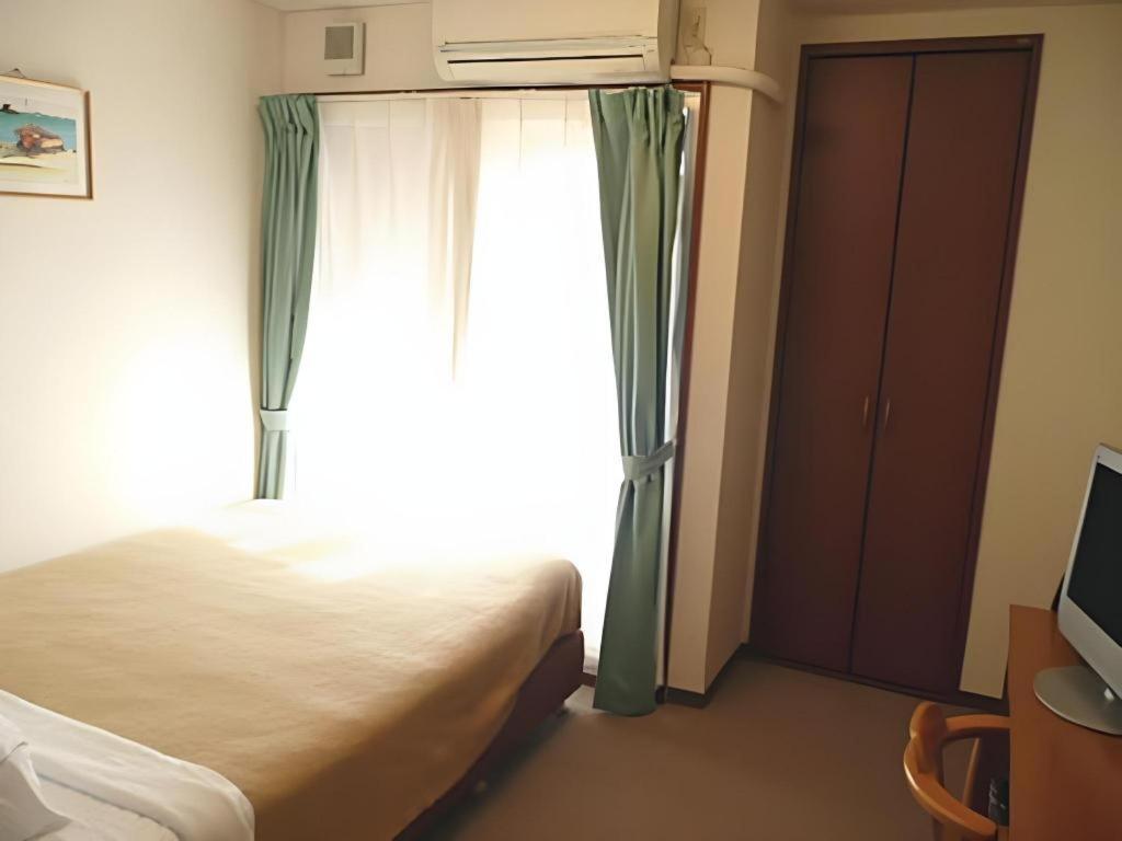 Hotel Peace Land Kume Naha Esterno foto