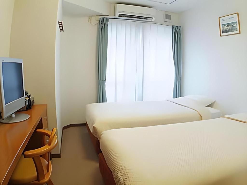 Hotel Peace Land Kume Naha Esterno foto