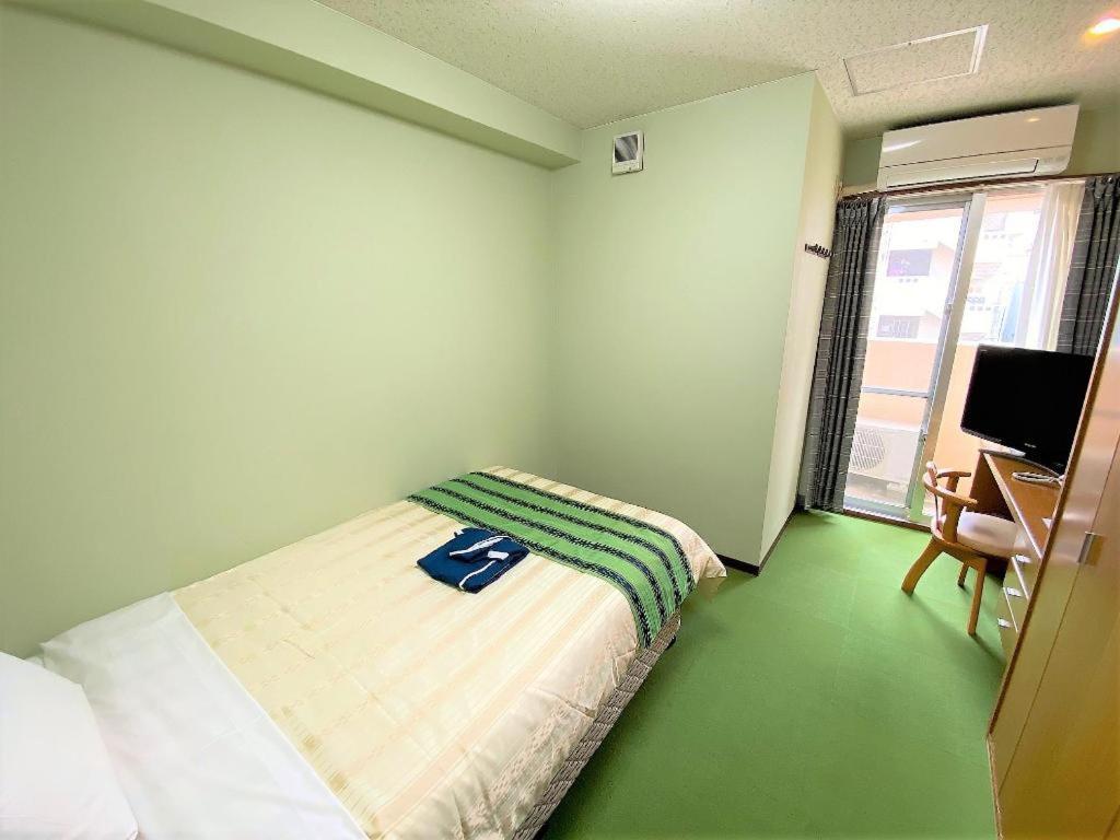 Hotel Peace Land Kume Naha Esterno foto